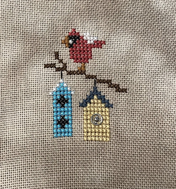 Stitch a beautiful cross stitch bird: Try cross stitch on linen